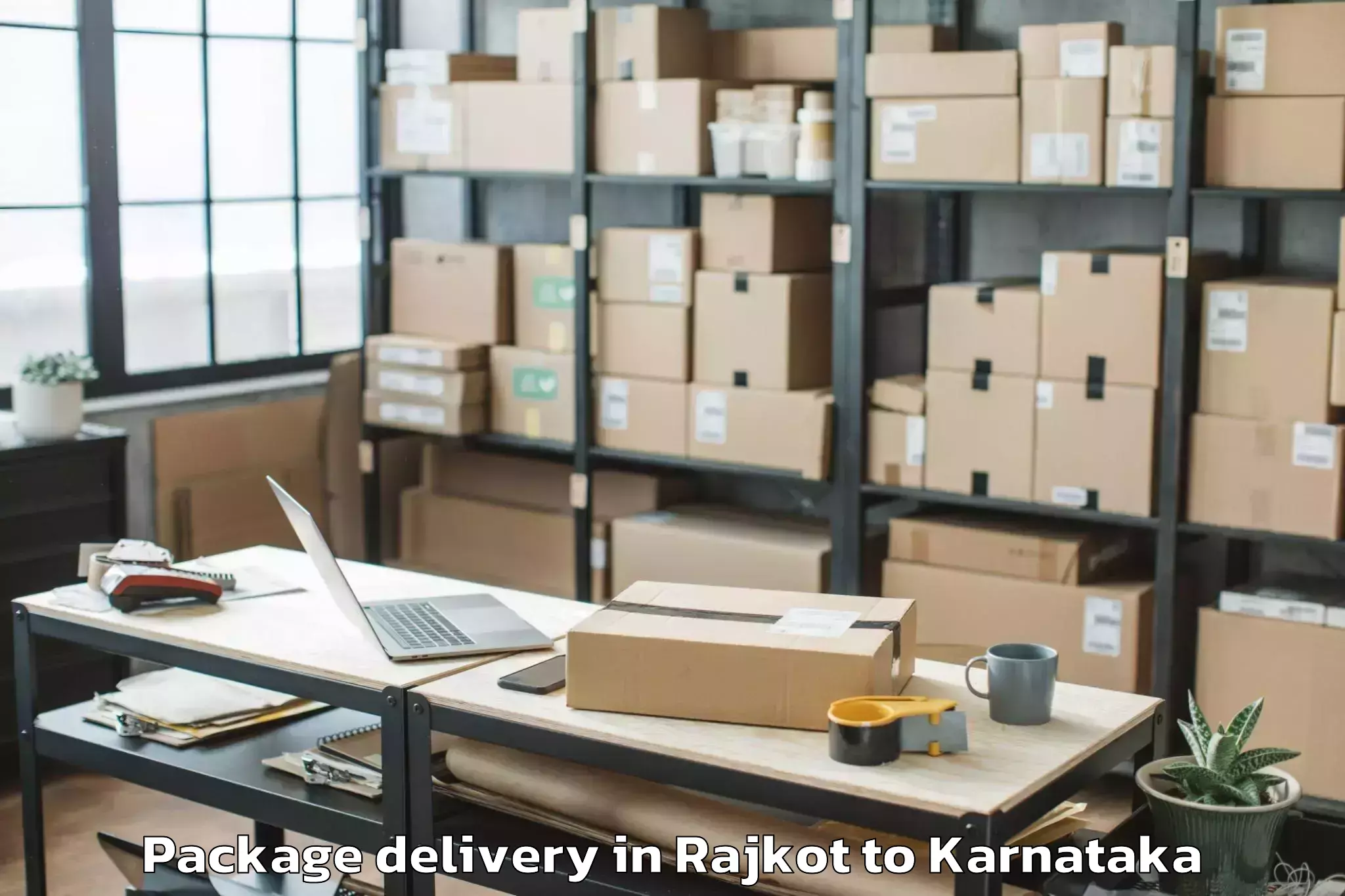 Trusted Rajkot to Karnataka State Rural Developm Package Delivery